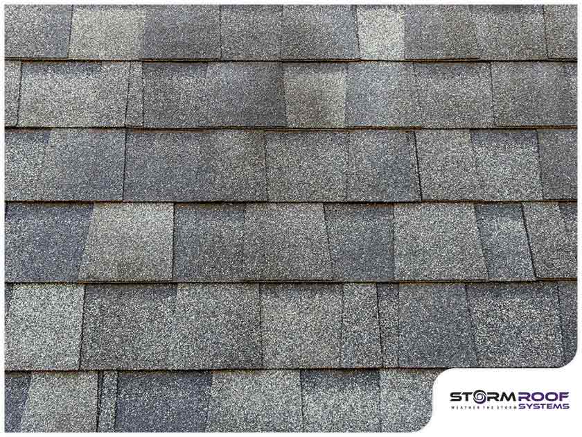 Why do asphalt shingles blister