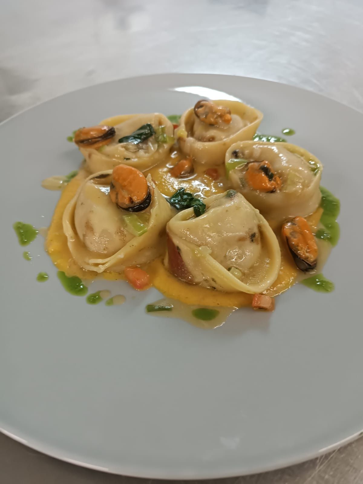 primo di pesce con frutti di mare