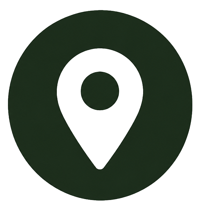 Dark green circle with a white location pin icon and center dot