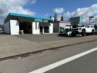 Auto Body Shop — Red Car in Springfield, OR
