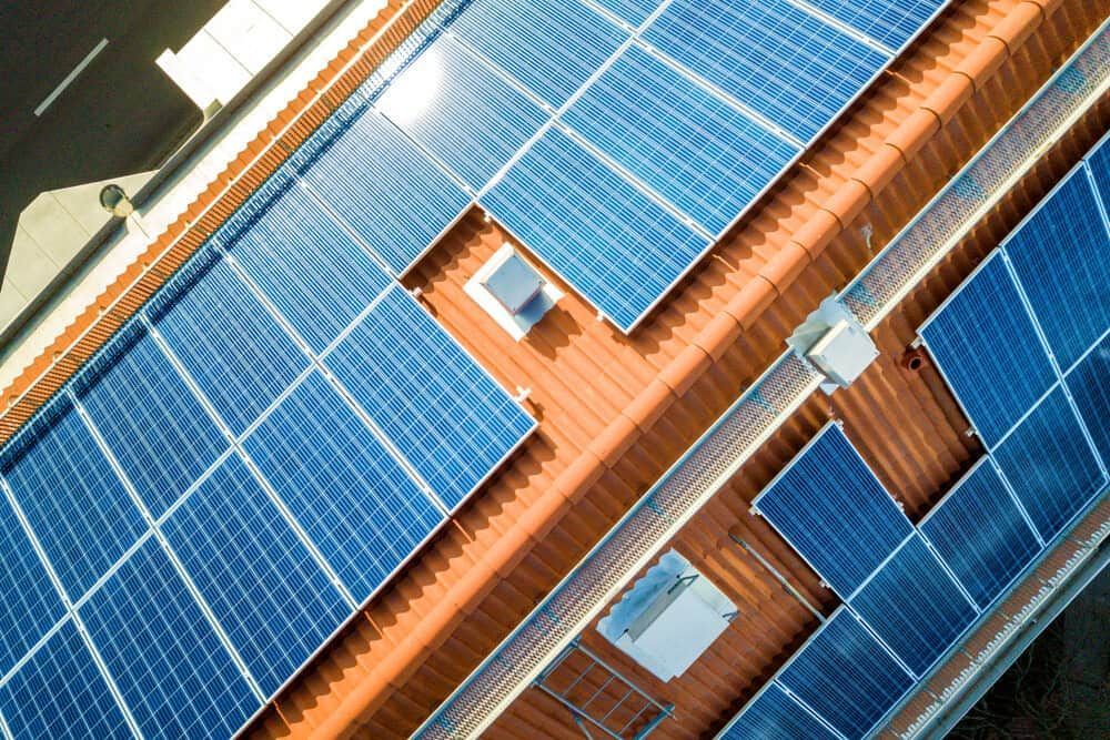 An Aerial View of a Building With Solar Panels on the Roof — 888 Solar Tek in Mullumbimby, NSW