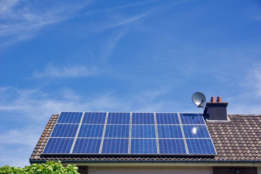 There Are Many Solar Panels on the Roof of a House — 888 Solar Tek in Yamba, NSW