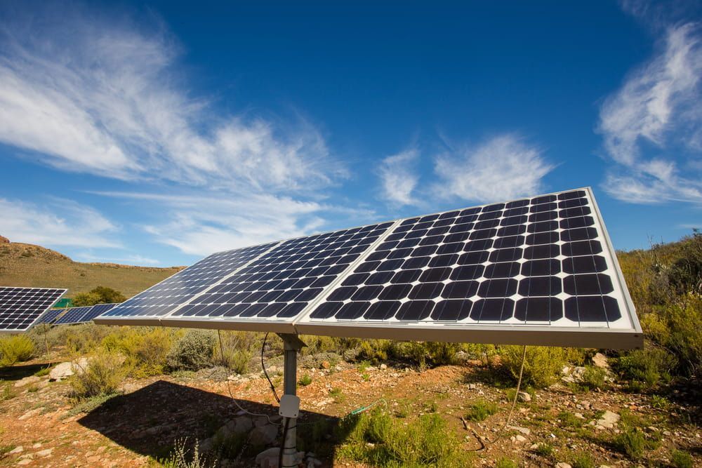 A Group of Solar Panels Are Sitting in the Middle of a Field — 888 Solar Tek in Byron Bay, NSW