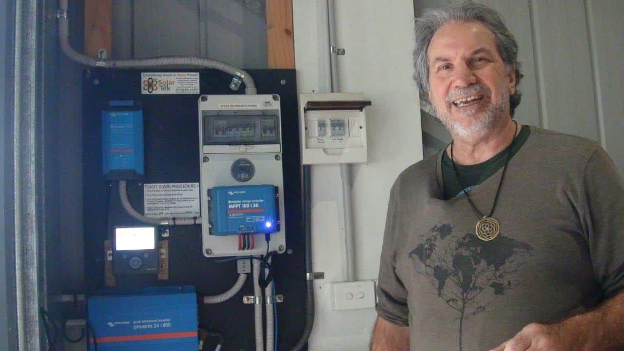Vincent Selleck is Standing in Front of a Wall With Electrical Equipment — 888 Solar Tek in Federal, NSW