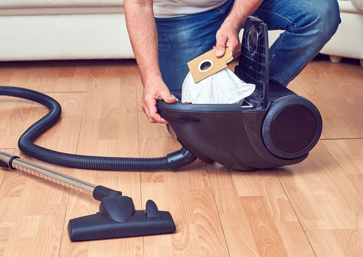 Removing Vacuum Filter — Asheville Spartanburg, SC — Ray's Vacuum & Sewing