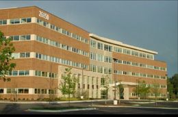 A large brick building with the number 25150 on the top