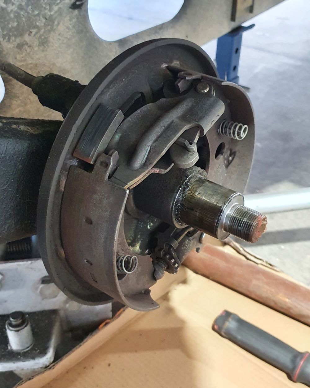 A Close Up of a Brake Disc on a Vehicle — Dempsters Caravan & RV in Thabeban, QLD