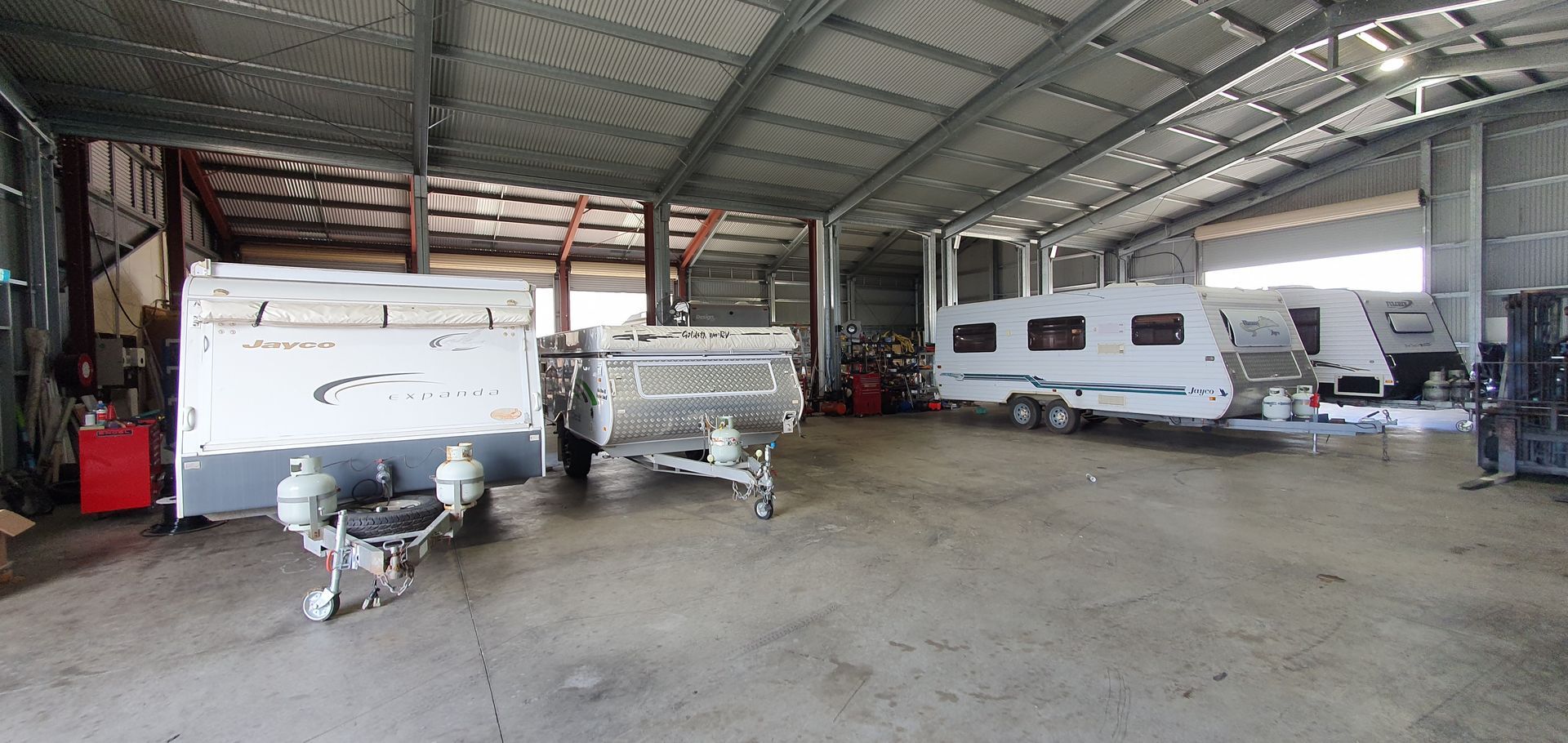 Caravans inside Dempster's Caravan & RV repair workshop in Thabeban, Bundaberg