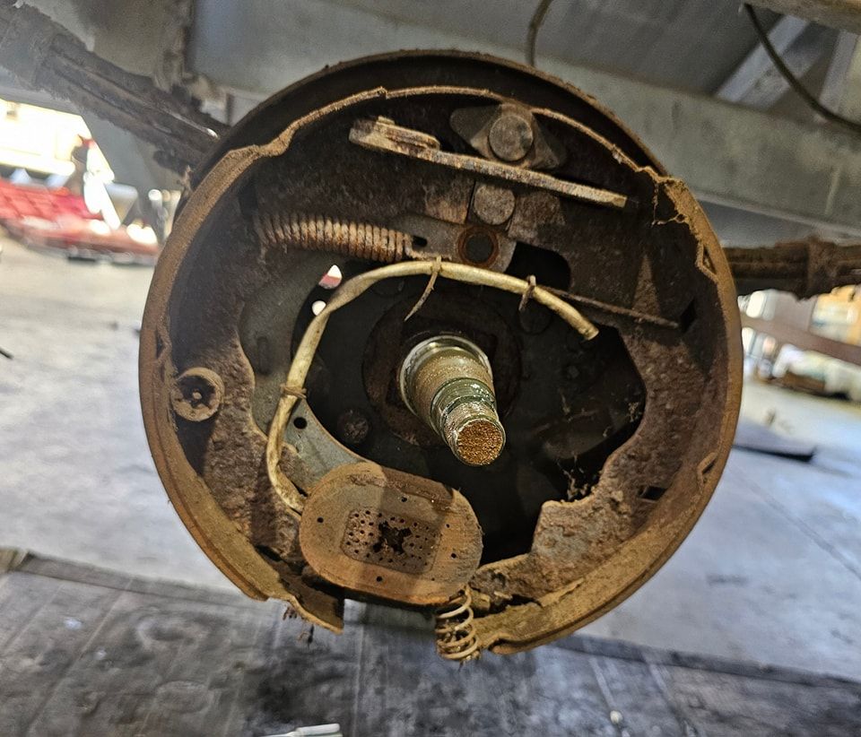 A Close Up of a Rusty Brake Drum on a Vehicle — Dempsters Caravan & RV in Thabeban, QLD