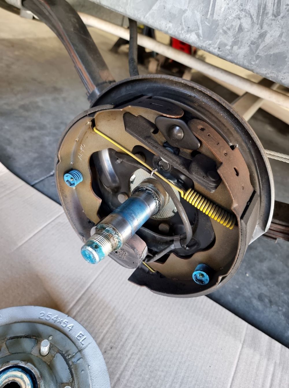 A Close Up of a Brake Caliper on a Trailer — Dempsters Caravan & RV in Thabeban, QLD