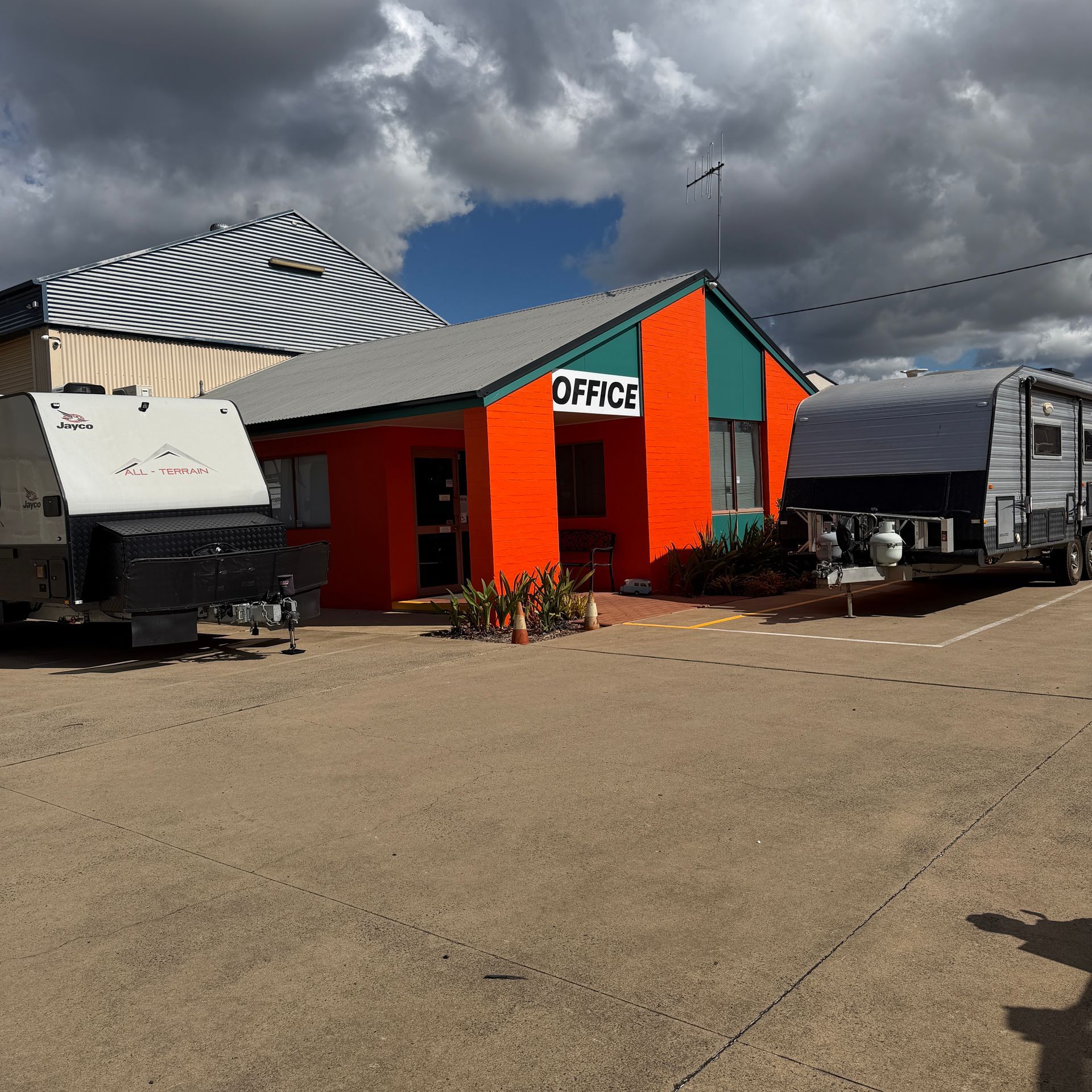 Bright Orange Office Building — Dempsters Caravan & RV in Maryborough, QLD