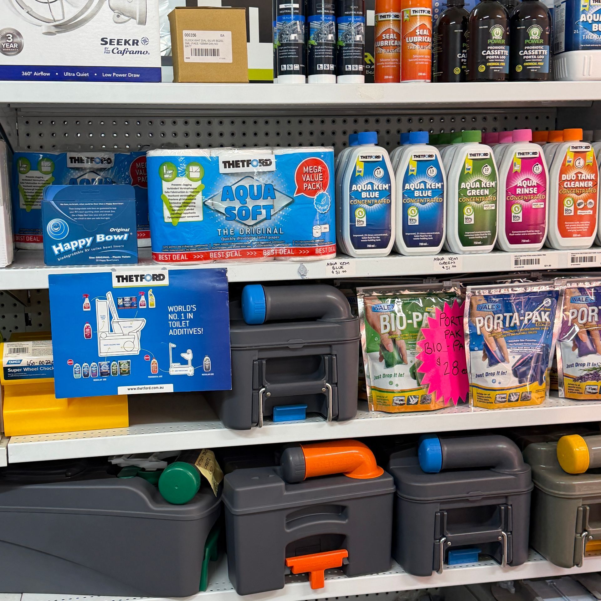Store Shelf With Cleaning Supplies, Bottled Detergents — Dempsters Caravan & RV in Childers, QLD