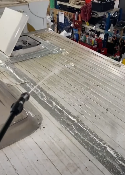 Close-up of a Weathered White Wooden Deck — Dempsters Caravan & RV in Thabeban, QLD