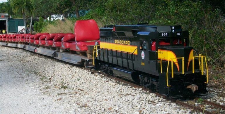 Model train, black and yellow locomotive labeled