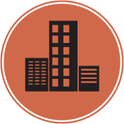 Buildings icon inside an orange circle. A tall building flanked by shorter buildings, all black silhouettes.