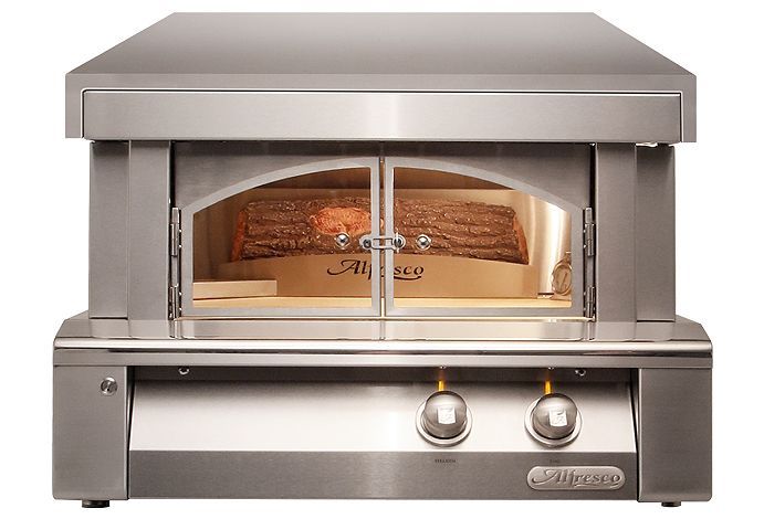 a stainless steel pizza oven with a chimney on top
