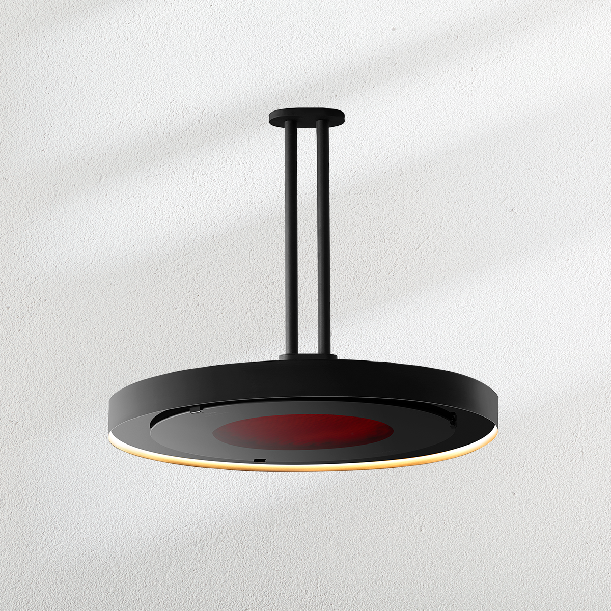 A black circular object is hanging from the ceiling.