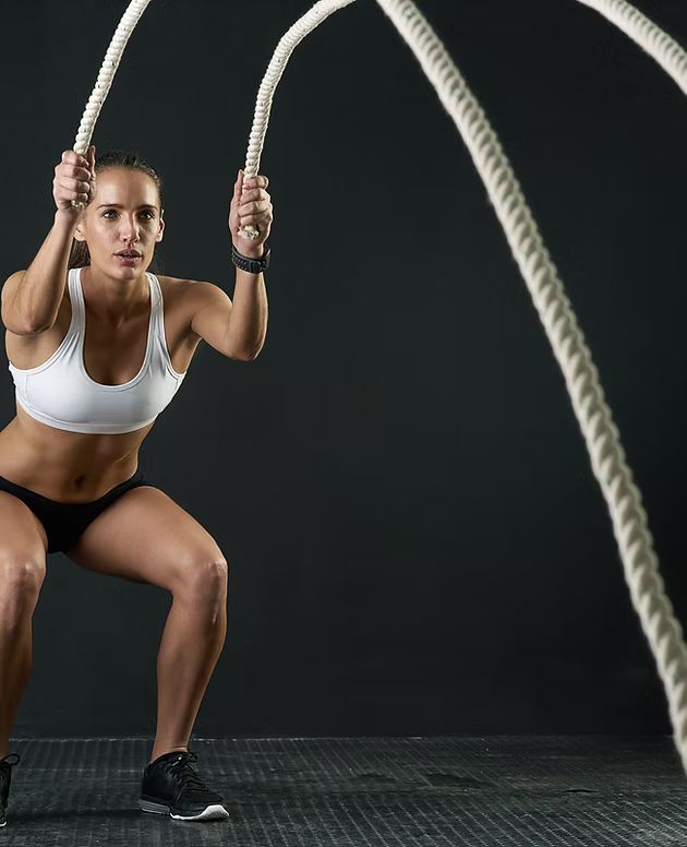 Woman with Fitness Ropes