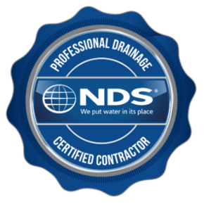 Blue NDS Professional Drainage certified contractor seal logo with globe icon and white text