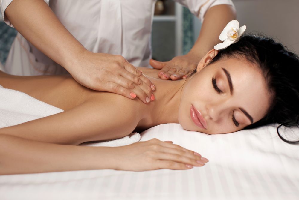 A Woman is Enjoying a Massage — Kerry's Body Therapy in Coolalinga, NT