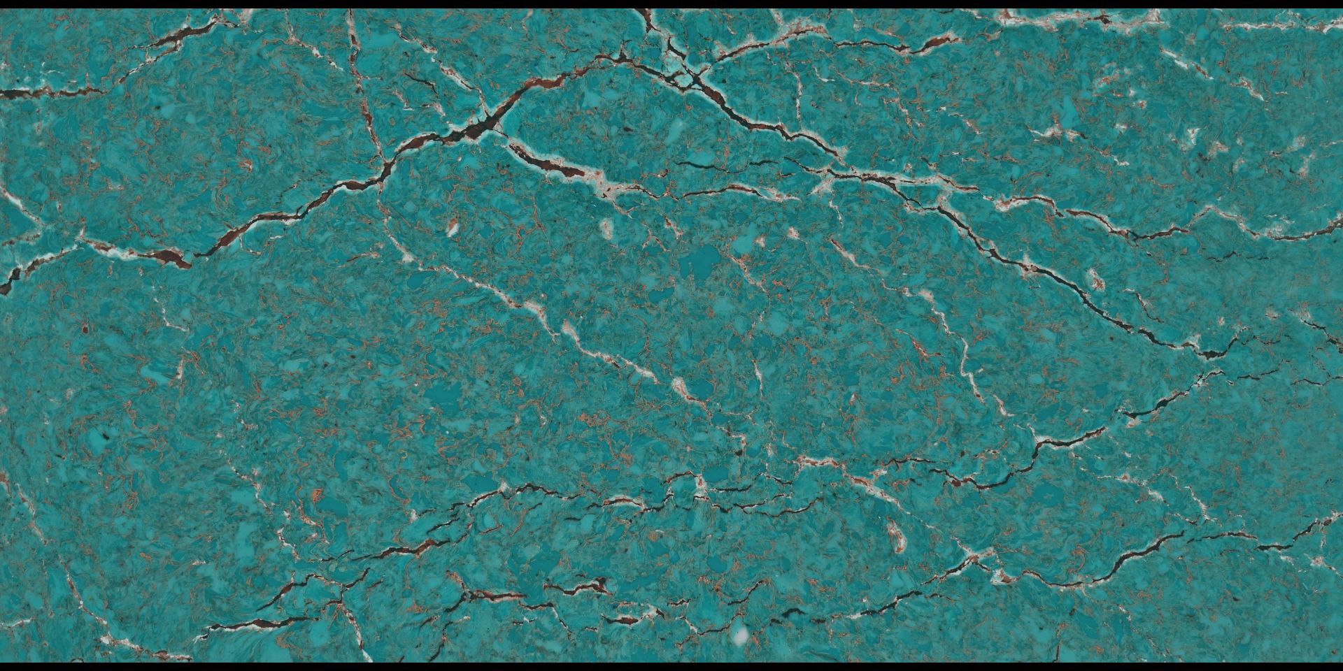 A close up of a turquoise tile with a cracked texture.