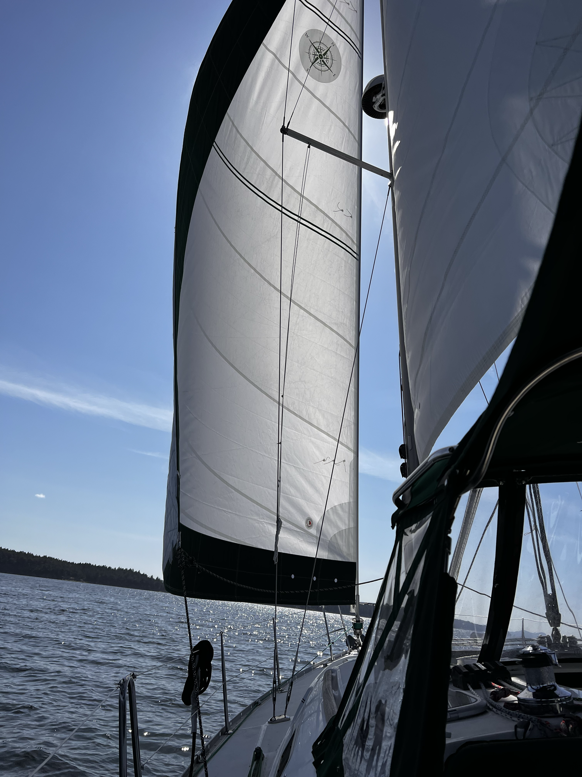 A sailboat is floating on a body of water