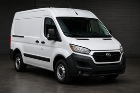 White cargo van on a dark studio background
