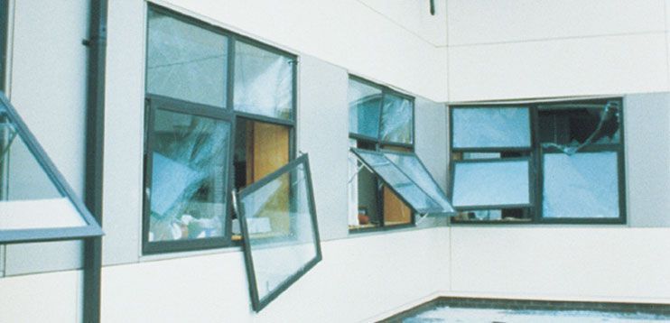 Seismic and Spontaneous Glass Breakage