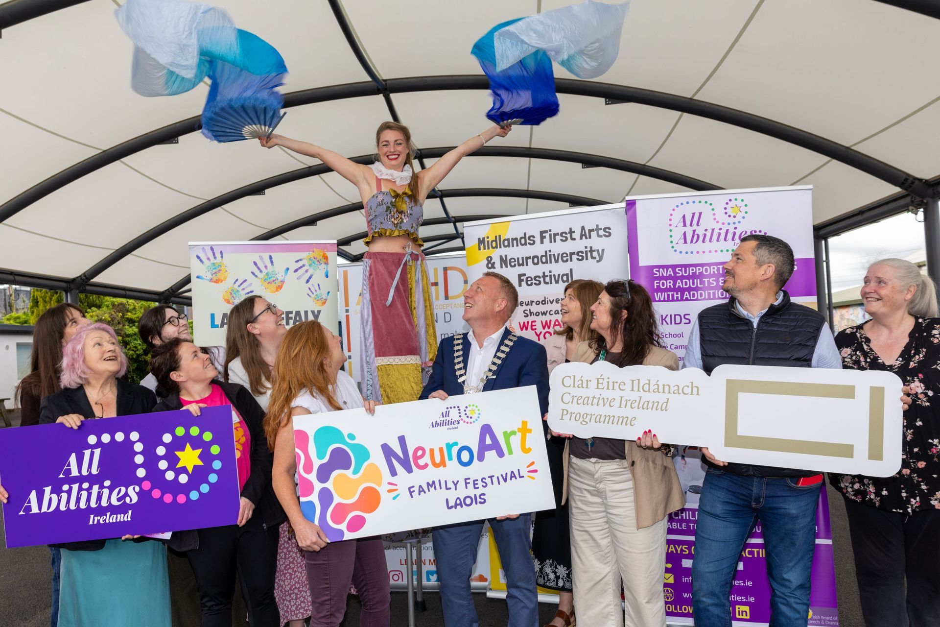 Launching the NeuroArt Family Festival to be held at The Old Fort in Portlaoise on the 22nd August 2026. From left: Iryna Yermak (All Abilities Ireland); Mary Connell (Dyslexia Early Intervention); Ciara O'Gorman (All Abilities Ireland); Catherine Dolan (ADHD Ireland); Suzanne Carroill, (Senior Executive Librarian LCC); Nicola Coss (All Abilities Ireland); Cllr Barry Walsh, Cathaoirleach of Laois County Council ; Bernie Foran, Laois County Librarian; Pat Wallis (LOETB Creative Youth Co-ordinator) David Broderick (Creative Ireland Laois) and Catherine Delaney (All Abilities Ireland) with stilt walker Shannon from The Cats Pyjamas.
Picture: Alf Harvey.
