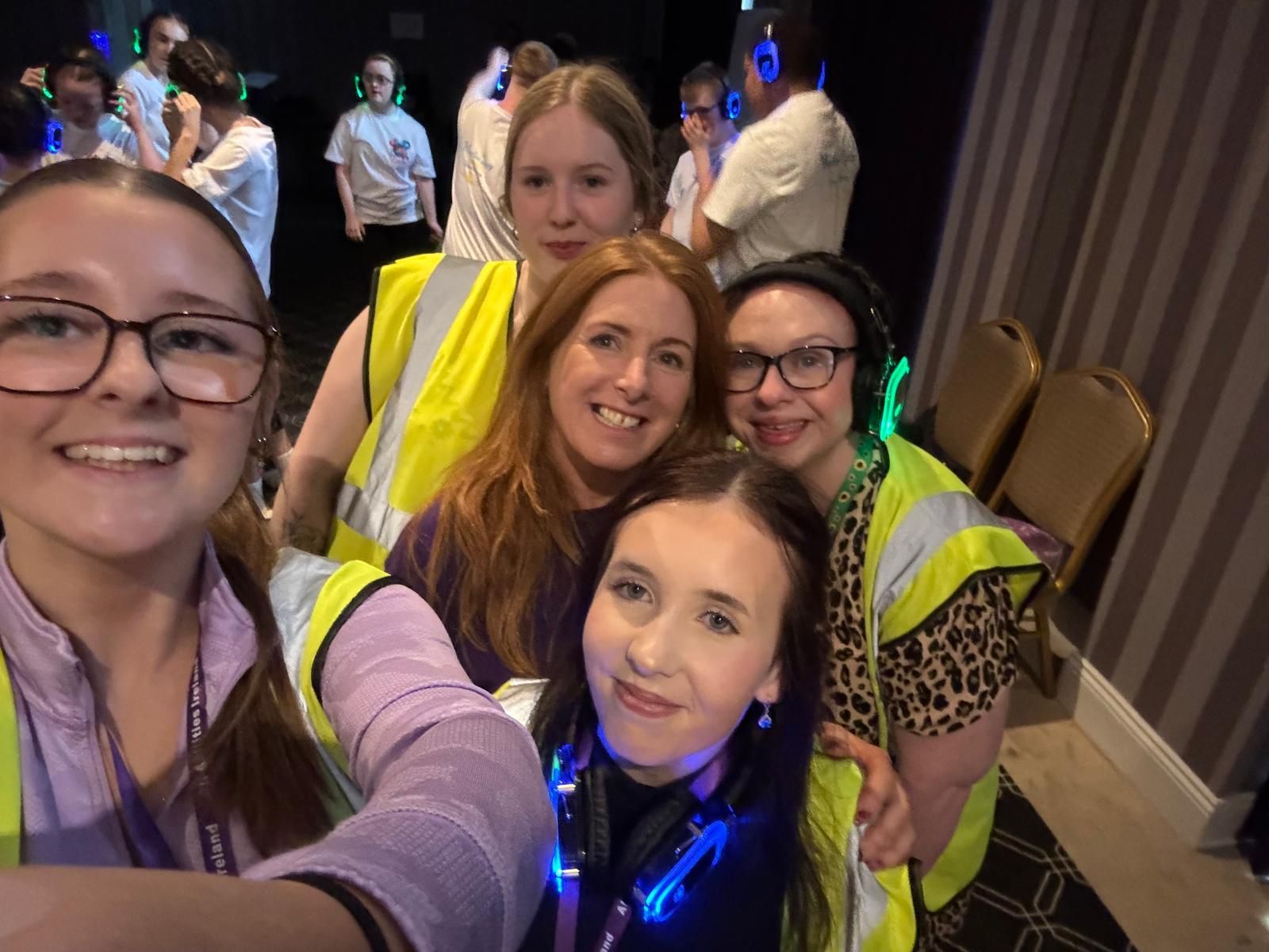 All Abilities team selfie: five women of different ages are smiling at the camera.