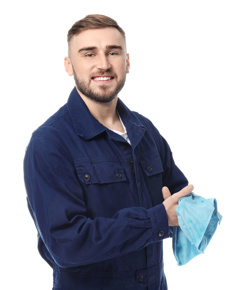 Mechanic holding a large tire and gesturing with an open hand on a white background