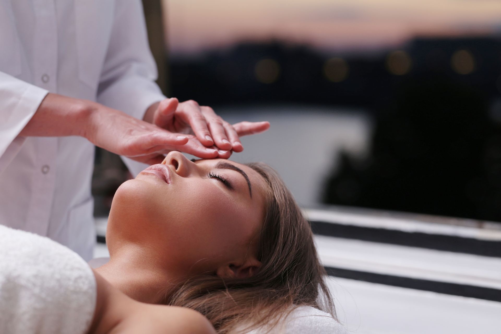A woman is getting a massage at a spa.