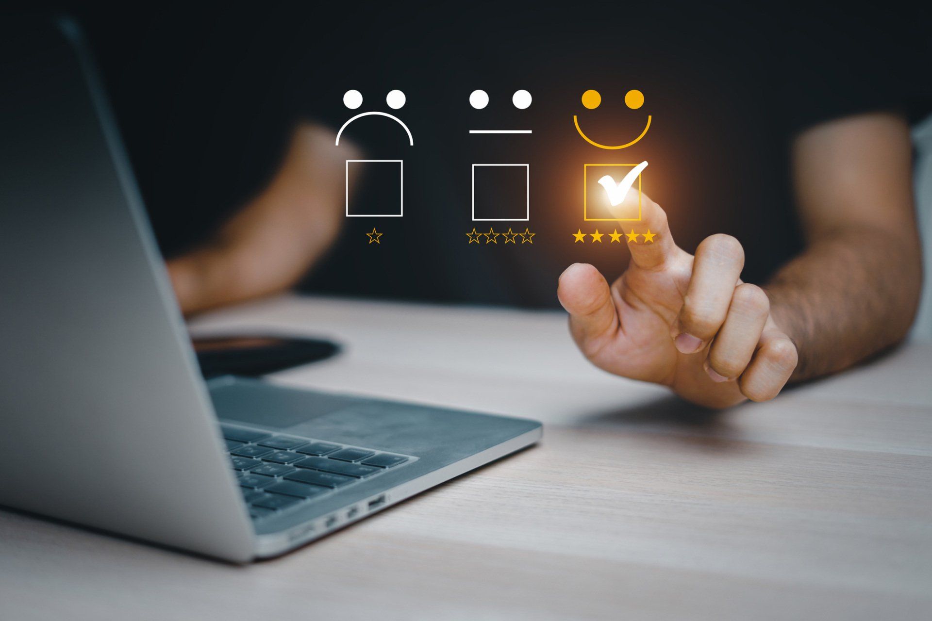 A man touches an emoji with a laptop on its front | Sydney, NSW | Always Apples A man touches an emoji with a laptop on its front | Sydney, NSW | Always Apples
