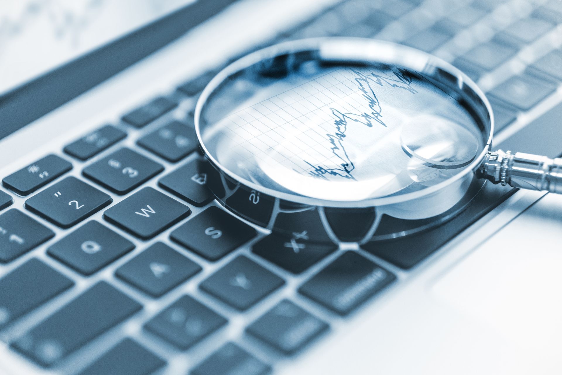 Laptop Keyboard And Magnifying Glass | Sydney, NSW | Always Apples