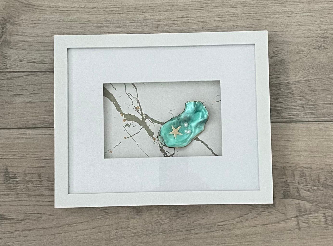 Schatje uit zee achter glas. Uitverkocht.