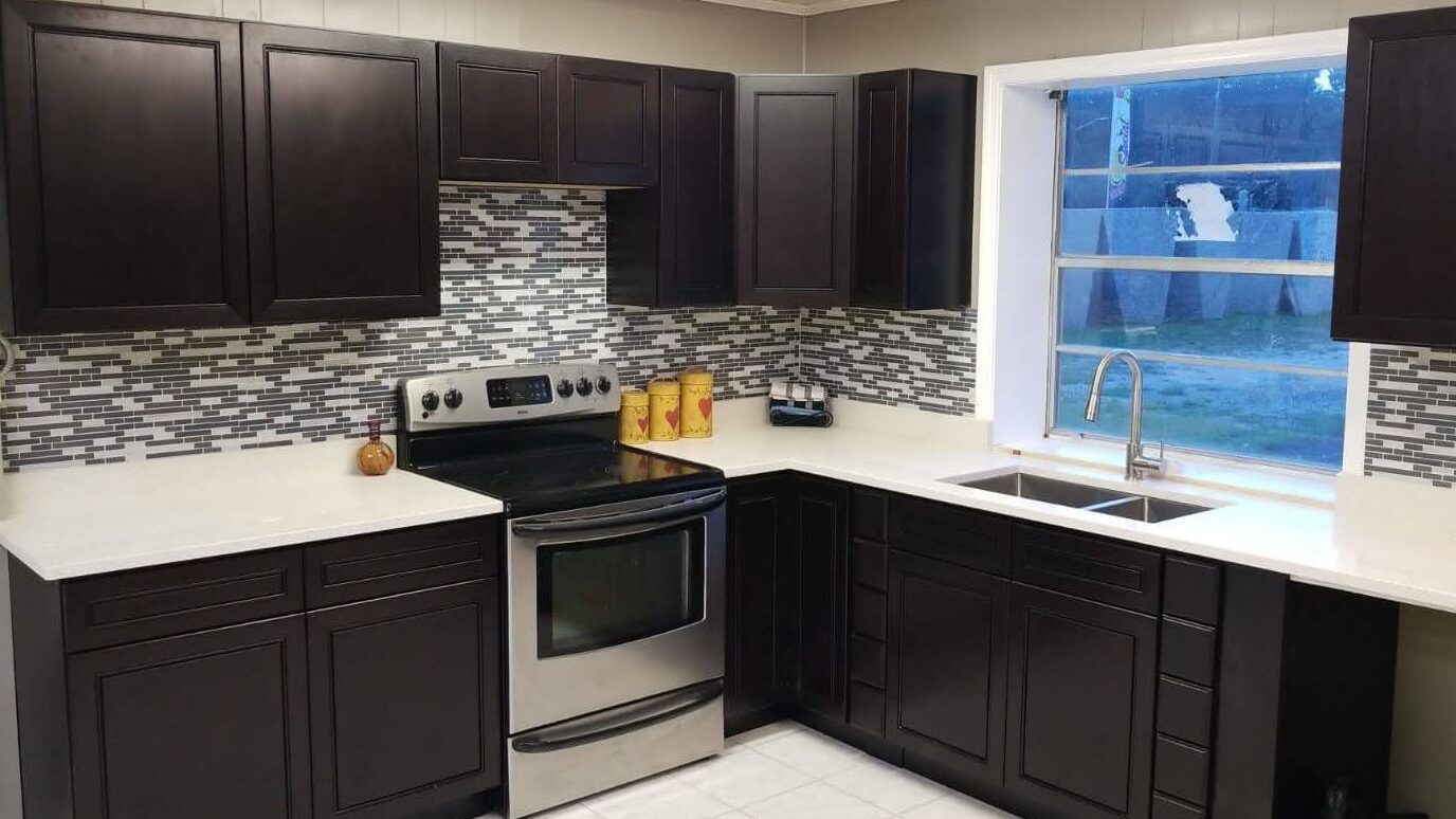 Clean and polished granite countertop in a modern kitchen