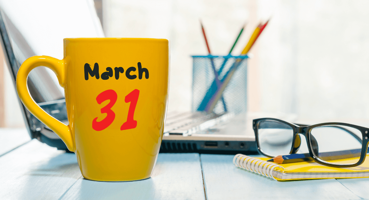 March 31 written on coffee cup to signify tax time