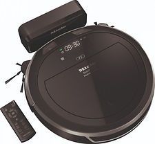 A black robot vacuum cleaner with a remote control attached to it.