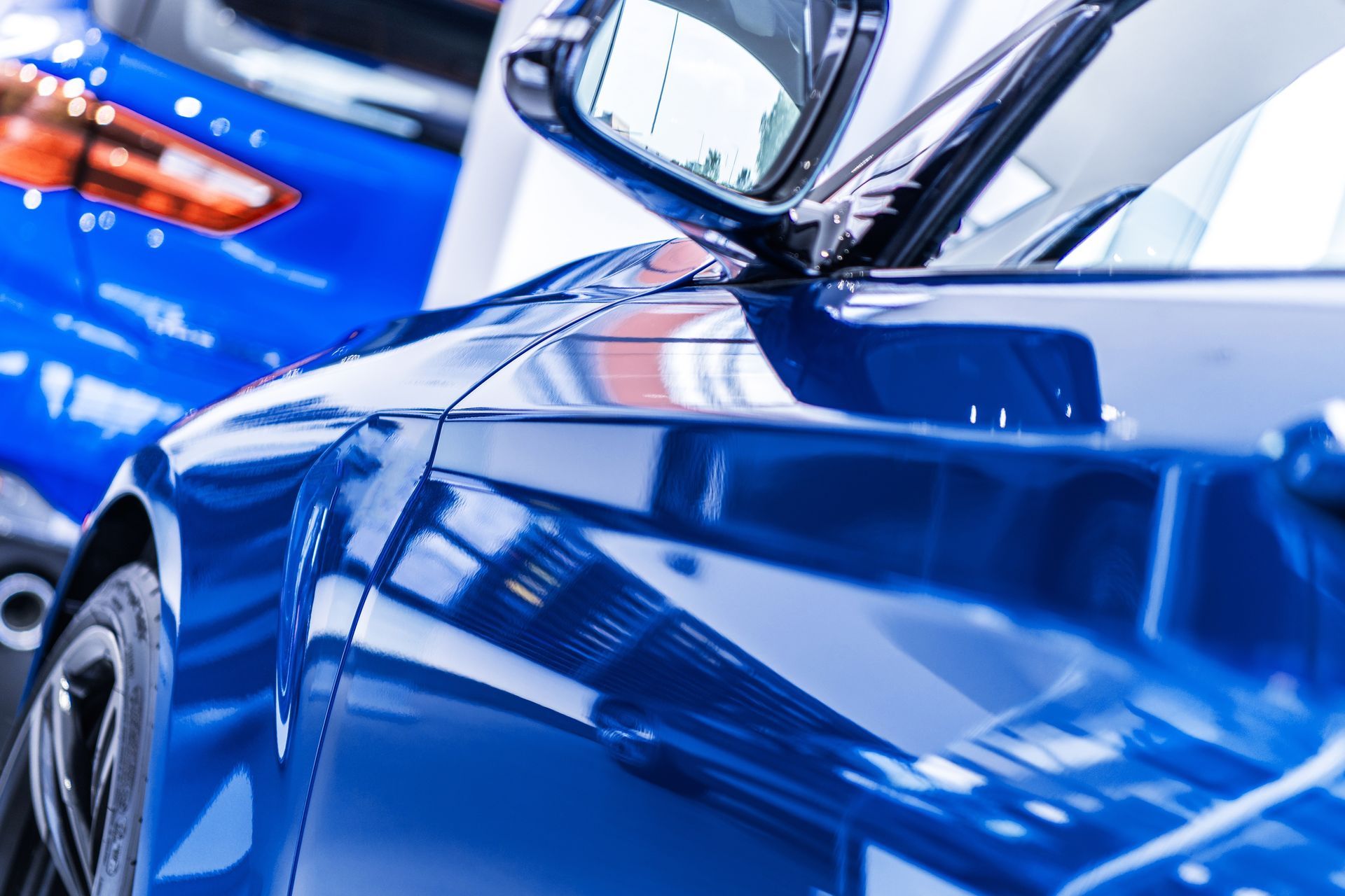 Close up of car paint, showcasing scratch resistant paint protection for flawless surface finish.