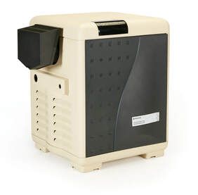 A swimming pool heater is sitting on a white surface.