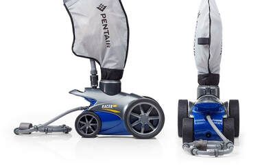A swimming pool vacuum cleaner is sitting on a white surface.