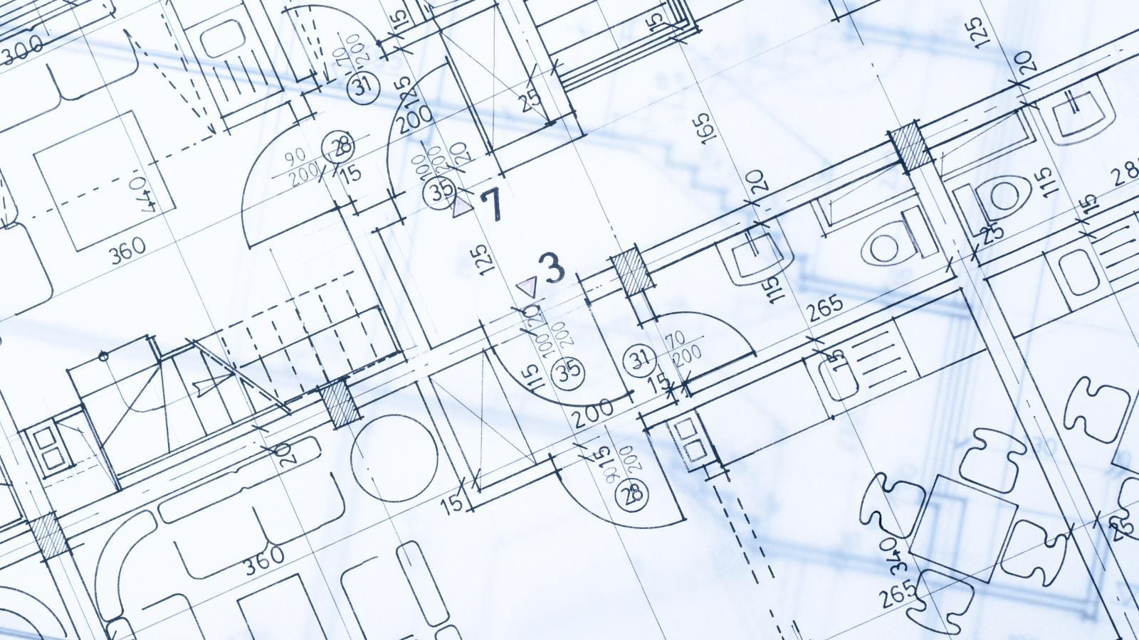 Blue technical blueprint with architectural floor plan sketches and measurements