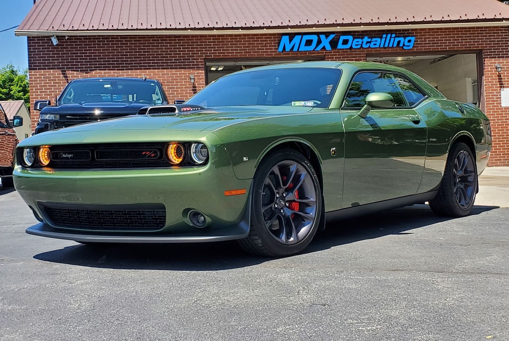 Drive with peace of mind with Opti-Coat ceramic coating at MDX Detailing in johnstown pa.