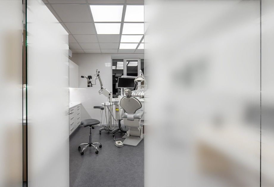 a view of a dental office through a glass door .architectual window tint. commercial resisdential tint. www.mdxdetailing.com