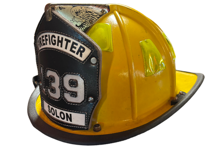 Yellow firefighter helmet with black front shield. Displays
