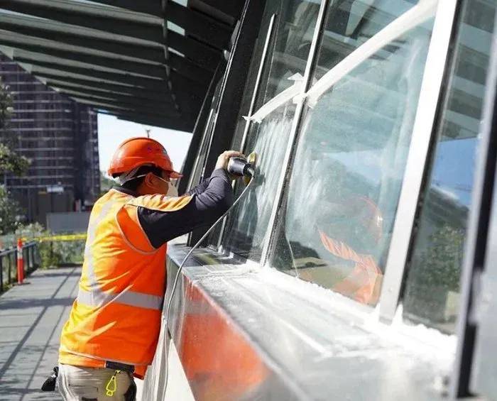 remove graffiti etched into glass