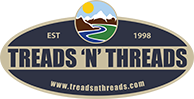 Logo for Treads 'N' Threads: Oval with landscape scene and text