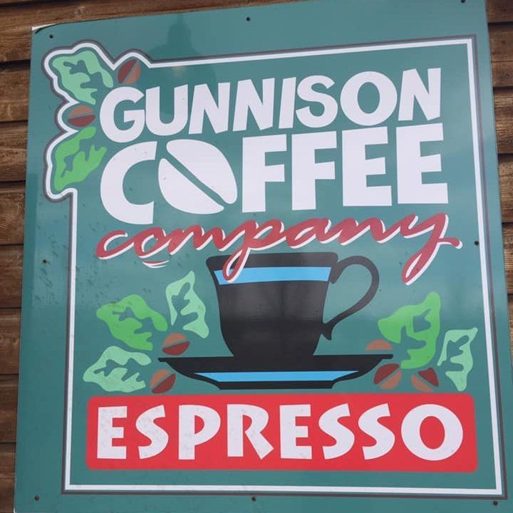 Sign for Gunnison Coffee Company, with coffee cup illustration and