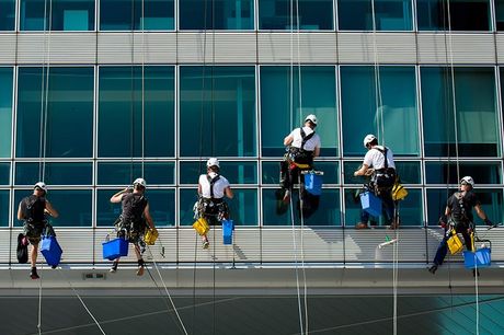Workers Cleaning The Building Windows Workers Cleaning The Building Windows