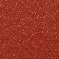 Reddish-brown speckled surface.